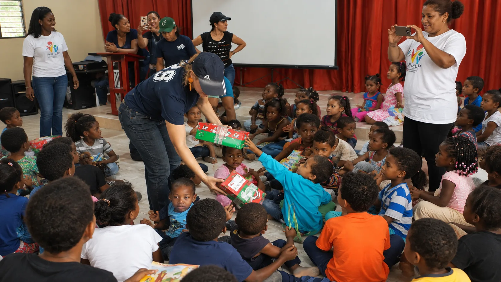 PFHI volunteers sharing time with a community